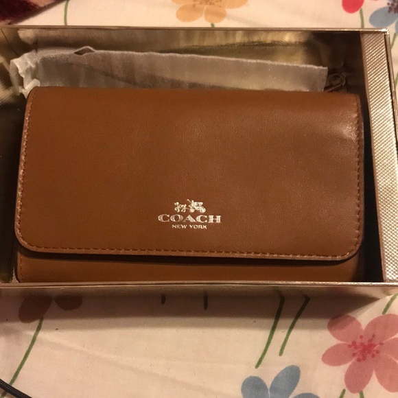 Coach Handbags - Coach brown wristlet. NWT